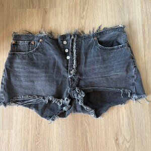 Levi’s high rise faded black raw hem button fly shorts 34"